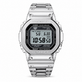 Silver-tone GMW-B5000 digital watch with a matching metal bracelet