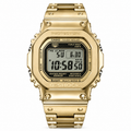 Gold-tone GMW-B5000 digital watch with a matching metal bracelet