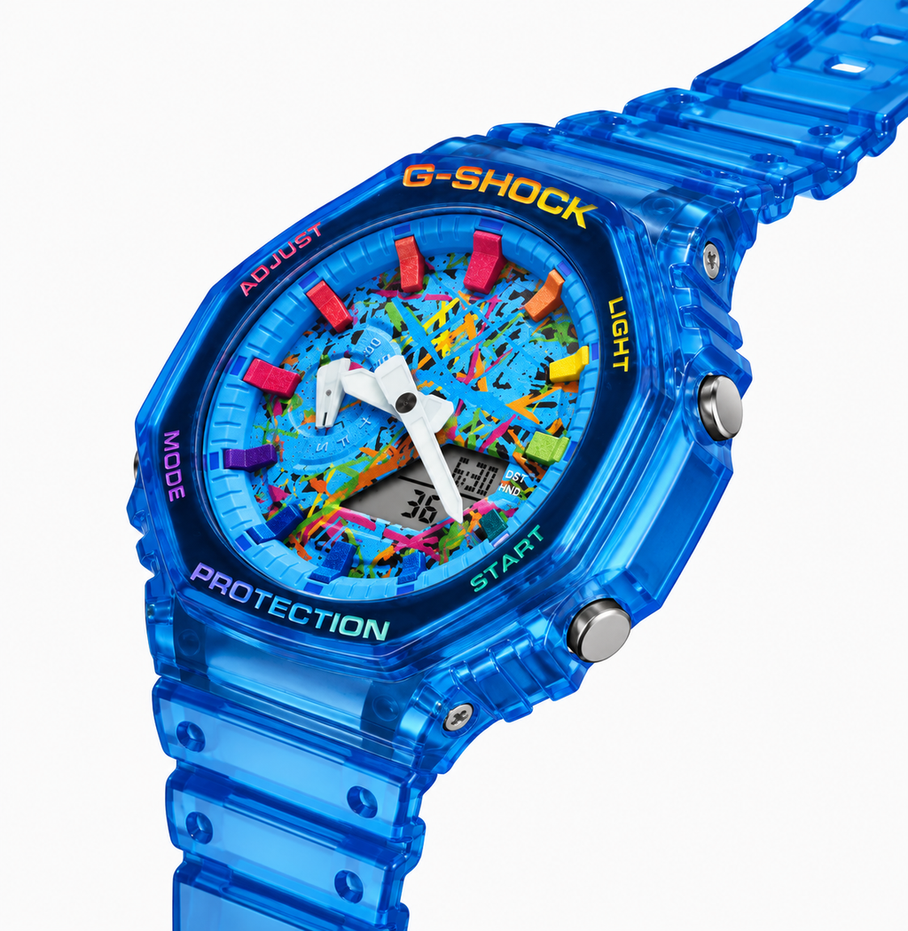 Blue Paint GA-2100 watch with a multicolor splatter dial, angled view