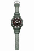 Coca-Cola-design GA-2100 watch showing the full translucent green strap