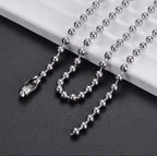 Silver-tone ball chain showing its connector and loose ends